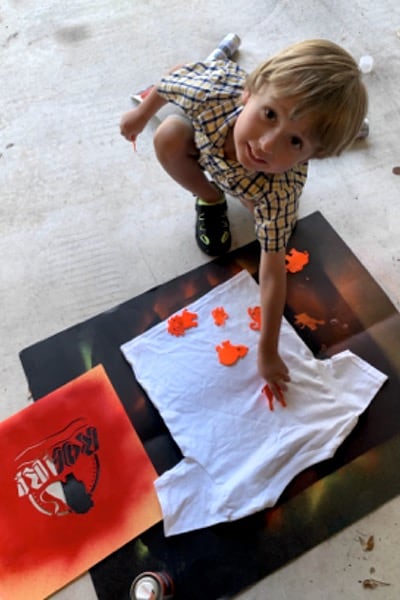 Preschooler helping make T-Shirt for VBS